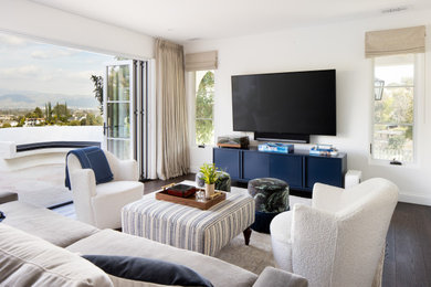 Example of a tuscan family room design in Los Angeles