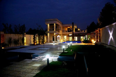 Example of a transitional home design design in Other
