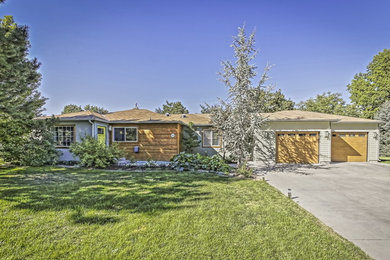 Trendy gray one-story wood exterior home photo in Boise