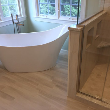 Master bathroom w stand-alone tub & sliding door