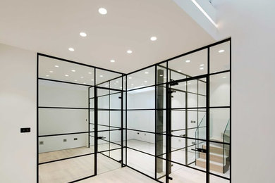 This is an example of a small contemporary fully buried basement in London.