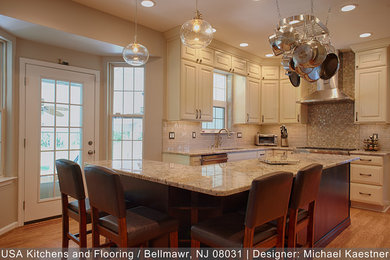 Example of a large transitional home design design in Philadelphia