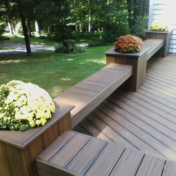 Ground level deck with planters