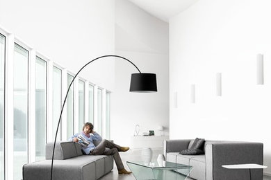 Living room - large modern formal and open concept concrete floor living room idea in San Francisco with white walls, no fireplace and no tv
