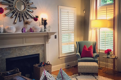 Example of an eclectic living room design in Charlotte
