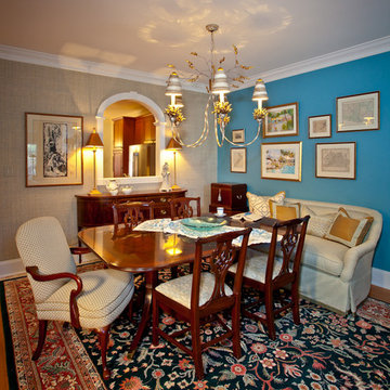 Intimate dining area with a whimsical custom-made chandelier and comfortable sea