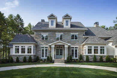 Large transitional white two-story mixed siding gable roof photo in Charlotte