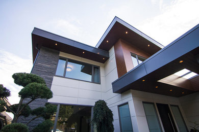 Inspiration for a contemporary house exterior remodel in Vancouver