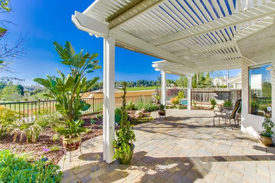 Example of a small tuscan patio design in San Diego