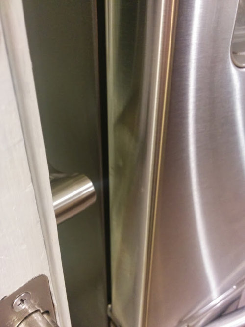 Door stopper on fridge