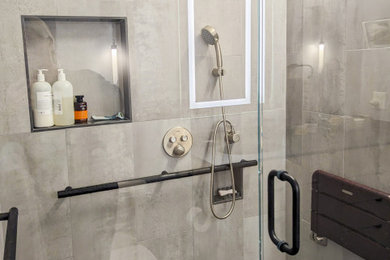 Example of a master walk-in shower design in San Francisco with a hinged shower door