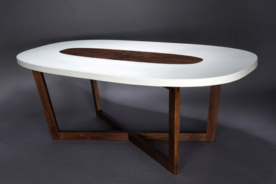 Concrete and walnut 'super-ellipse' dining table