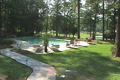 Inspiration for a cottage backyard rectangular lap pool remodel in Other
