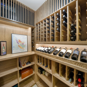 Traditional Oak Wine Cellar with Built-In Lighting – Chicago