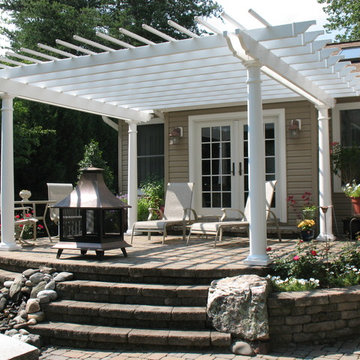 Backyard Patio with Pergola, Landscaping and Pond