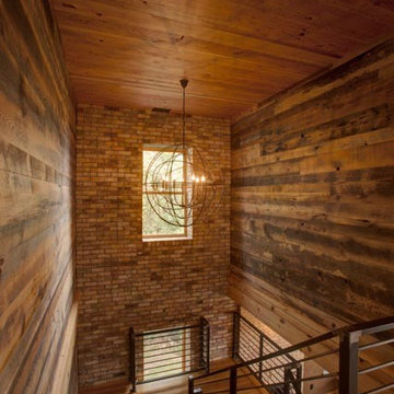 Weathered Antique Paneling with Pine Ceiling in an Industrial Stairwell