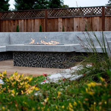 Fire place with custom concrete bench seating