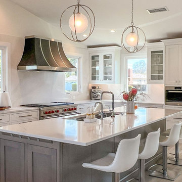 Transitional Two Tone Gourmet Kitchen with Inset Custom Cabinetry