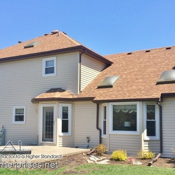 Alside CenterLock Vinyl Siding in Maple Color with White Trim & Brown Roof in Na