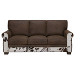 Artistic Leathers - Top Grain Brown Leather Sofa with Natural Cowhide and Hand Lacing - Inspired by Western designs, The Cowboy collection is made with premium top-grain leather with accented natural cowhide selected from the finest tanneries. Hand-stitched detailing beautifies the arm front, separating it from ordinary looks. The hardwood frame and pocketed spring cushion core are made to the highest comfort, durability, and longevity standards.