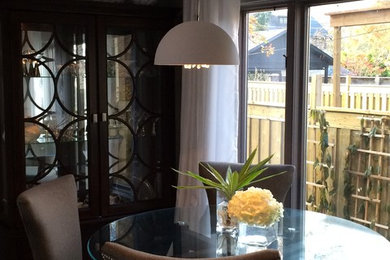 Example of a trendy dining room design in Toronto