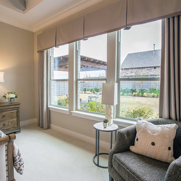 In this spacious bedroom, single-hung windows bring the outside in