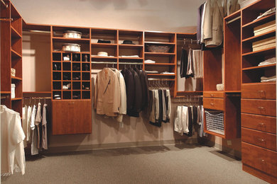 Mid-sized elegant gender-neutral carpeted and gray floor walk-in closet photo in Charleston with flat-panel cabinets and white cabinets