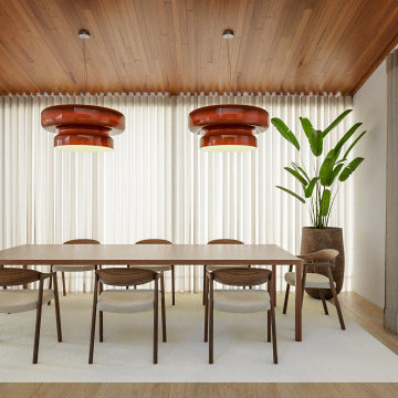 Aroeira dining room with round table, pendants and curtains