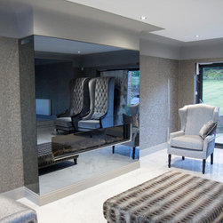 Grey Dielectric Mirror TV Glass Fireplace with a 65" OLED TV - Living Room Furniture