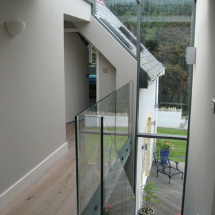 Modern glass railing staircase in Devon.