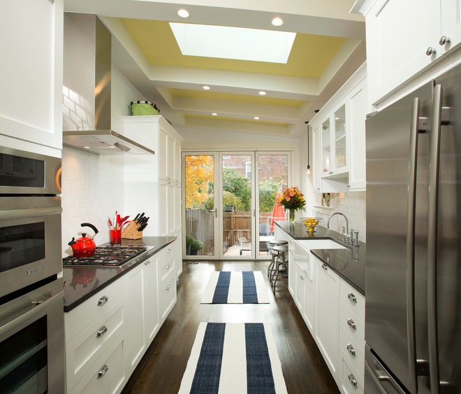 Transitional Kitchen by Four Brothers LLC
