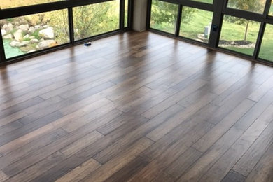 Example of a transitional sunroom design in Omaha