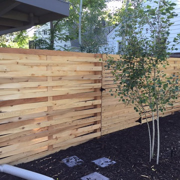 Custom modern/contemporary horizontal cedar and exotic woods
