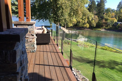 Example of a trendy side yard deck design in Calgary