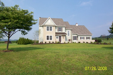 Inspiration for a large country exterior home remodel in Philadelphia