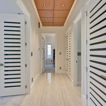 Main hallway showcasing uniform slitted doors