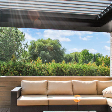 A louvered pergola, a must for all high-end outdoor living spaces.
