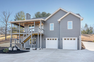 Example of a cottage exterior home design in Other