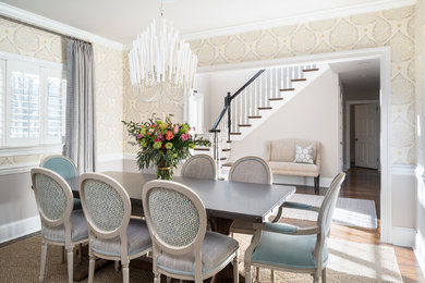 Enclosed dining room - mid-sized transitional medium tone wood floor and brown floor enclosed dining room idea in Philadelphia with white walls and no fireplace