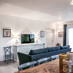 Inspiration for a shabby-chic style home theater remodel in Other