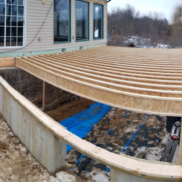 Two Story Home Addition with Home Gym and Four Seasons Room