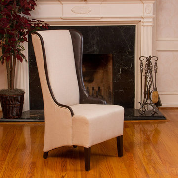 Contemporary Dining Space Featuring Beige High Wingback Chair