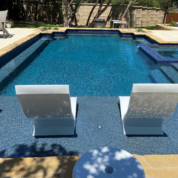 Backyard Paradise Geometric Pool and Flush Spa