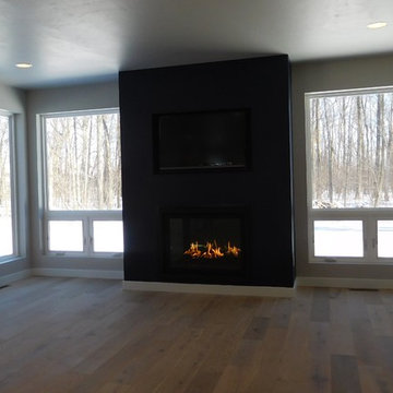 Floor to Ceiling Windows with Contemporary Fireplace