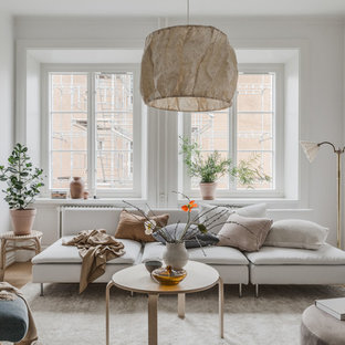 Foto på ett minimalistiskt vardagsrum