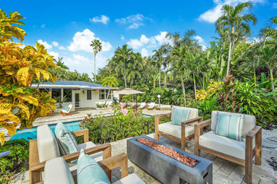 Beach style patio photo in Miami
