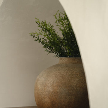 Ceramic Vase in Arched Wall Niche