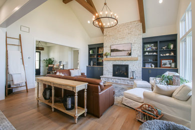 Cottage living room photo in Other