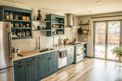 Example of an eclectic kitchen design in Denver