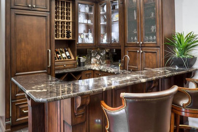 Seated home bar - mid-sized traditional u-shaped porcelain tile seated home bar idea in Toronto with an undermount sink, recessed-panel cabinets, dark wood cabinets, quartzite countertops and mirror backsplash